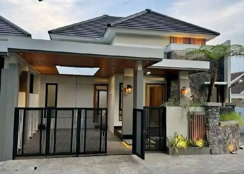 Cat Pagar Tembok Warna Abu-Abu dengan Batu Alam Andesit yang Bagus